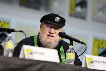 George R.R. Martin speaks onstage during HBO's "House of the Dragon" panel at Comic Con.