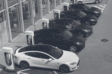 BRATISLAVA, SLOVAKIA - 2022/08/26: Vehicles seen at a Tesla charging station in Bratislava. EVs are ...