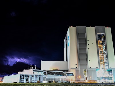 Lightning strikes as NASA's Artemis I Moon rocket prepare to rolls out to Launch Pad Complex 39B at ...