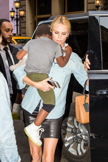 Charlize Theron and her child Jackson Theron are seen having dinner at The Polo Bar on May 11, 2015 ...