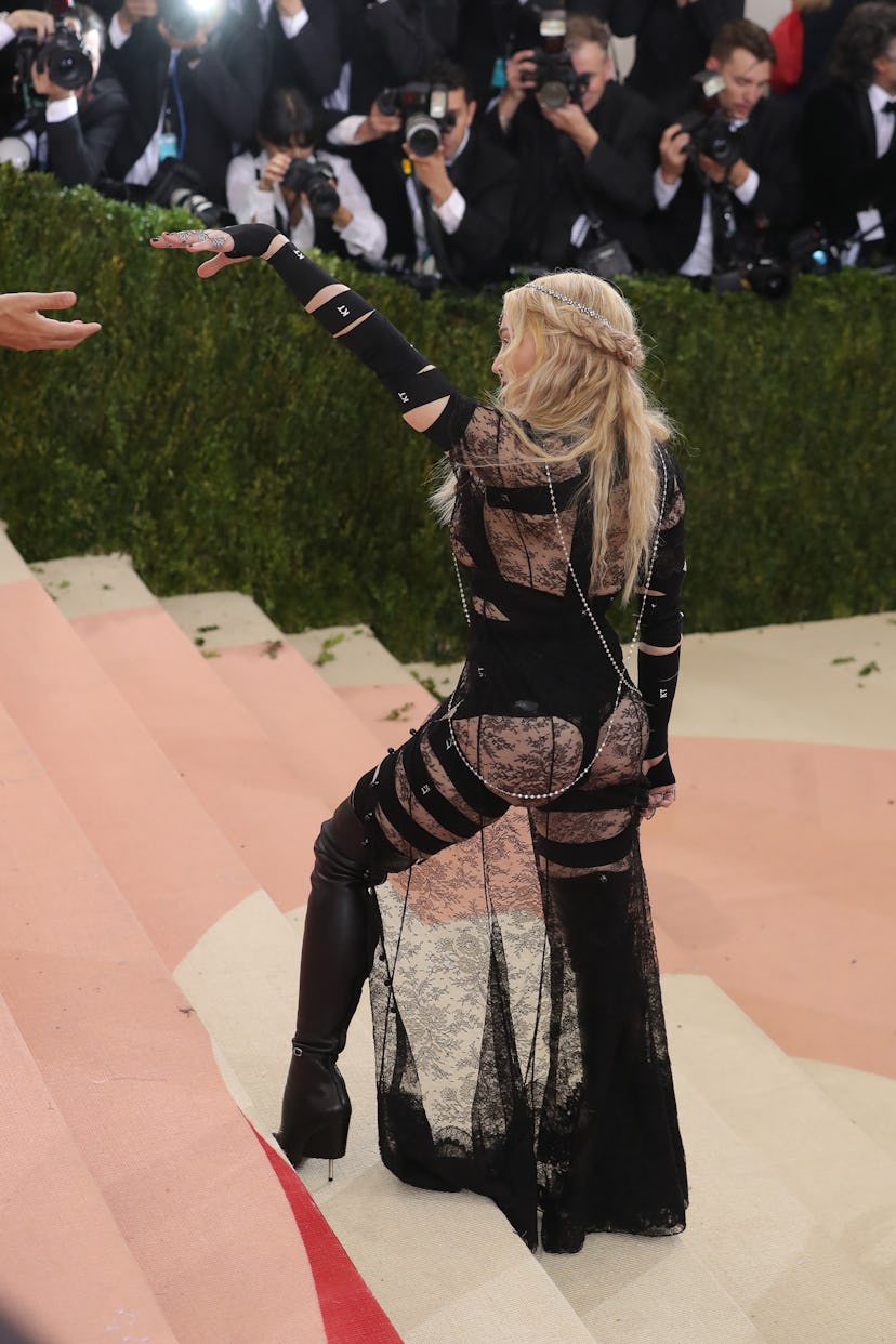 Madonna attends the “Manus x Machina: Fashion In An Age Of Technology” Costume Institute Gala in 201…