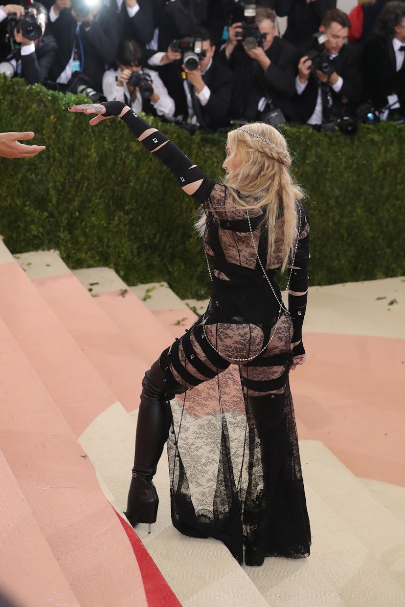 Madonna attends the "Manus x Machina: Fashion In An Age Of Technology" Costume Institute Gala in 201...