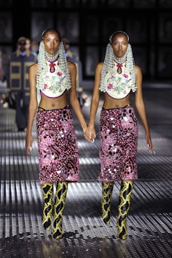 MILAN, ITALY - SEPTEMBER 23: Models walk the runway of the Gucci Twinsburg Show during Milan Fashion...