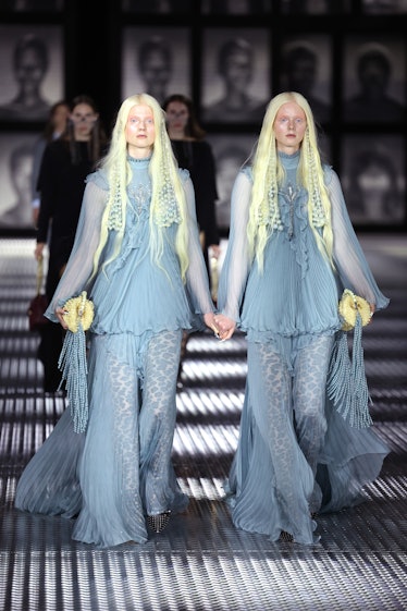 Models in matching outfits at Gucci Twinsburg Show during Milan Fashion Week Spring/Summer 2023
