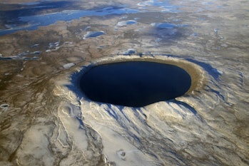 October 12, 2007 - Aerial view of Pingualuit Crater, Quebec, Canada. The crater was formed millions ...