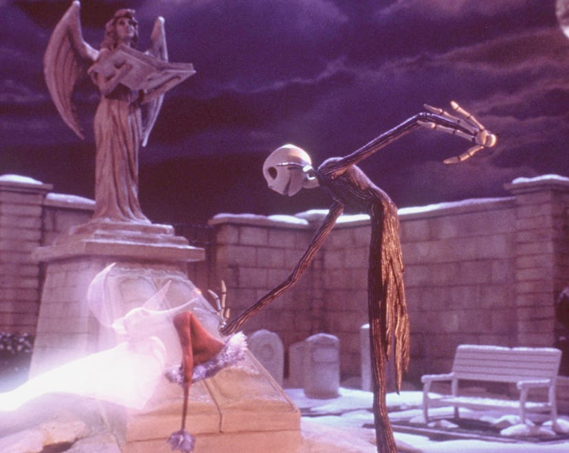 370100 03: Hat in hand, a sadder-but-wiser Jack Skellington gets a boost from his ghost dog, Zero, w...