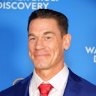 John Cena breaks the world record for most wishes granted through the Make-A-Wish Foundation.