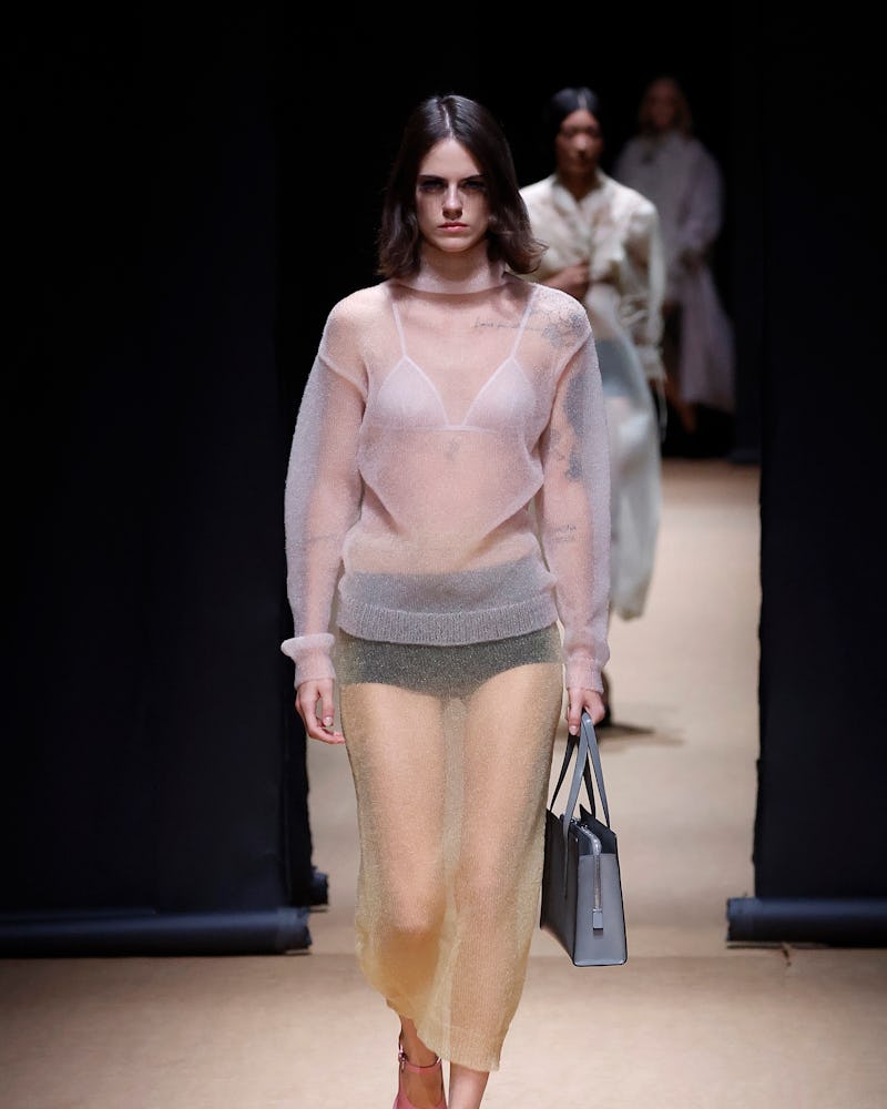 Prada's gauzy skirt in pastel hues with exposed undergarments from Spring/Summer 2023 Show.