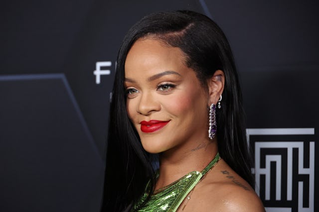 LOS ANGELES, CALIFORNIA - FEBRUARY 11: Rihanna poses for a picture as she celebrates her beauty bran...