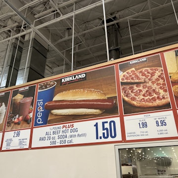 Costco Food Court Hot Dog sign. The company just announced that its hot dog soda combo will stay $1....