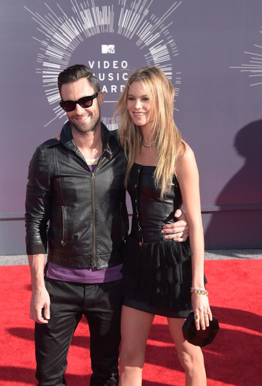 Adam Levine and Behati Prinsloo's body language amid his cheating scandal was noteworthy.