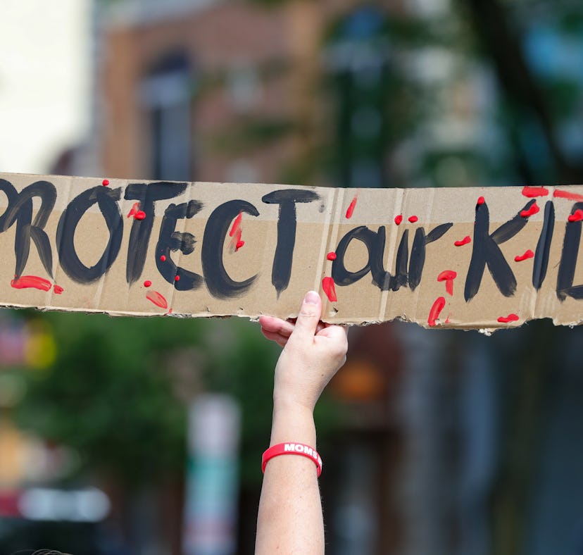 BLOOMSBURG, PENNSYLVANIA, UNITED STATES - 2022/06/11: A protester holds a placard at a March for Our...