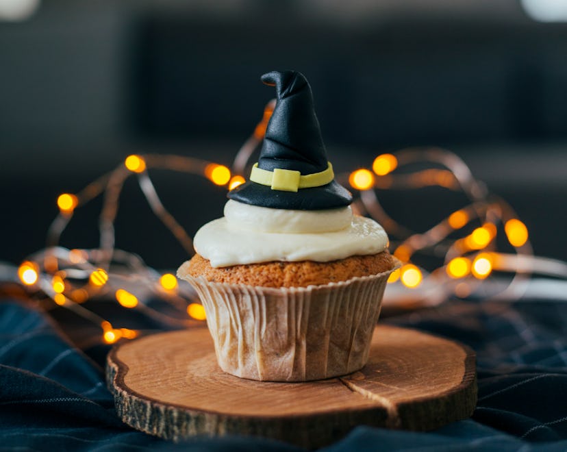 A witch hat cupcake is one idea for food to serve at a 'Hocus Pocus' party.