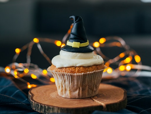 A witch hat cupcake is one idea for food to serve at a 'Hocus Pocus' party.