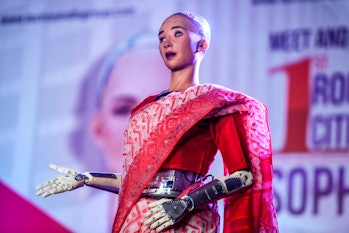 The humanoid robot Sophia speaking at a conference.