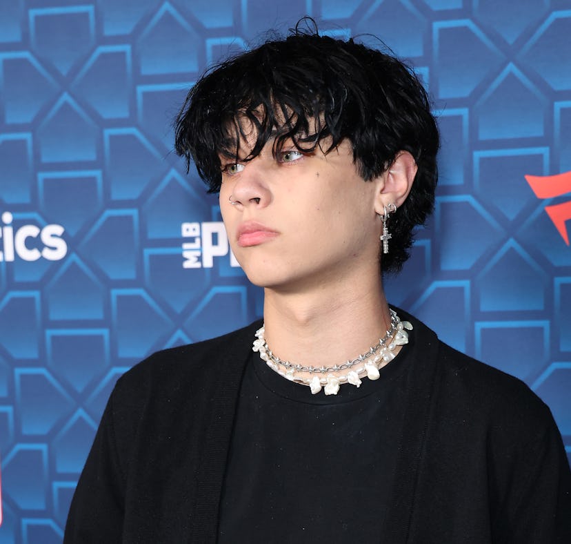 Before Landon Barker's pink hair, Landon Barker had dark hair seen as Landon Barker attends Michael ...