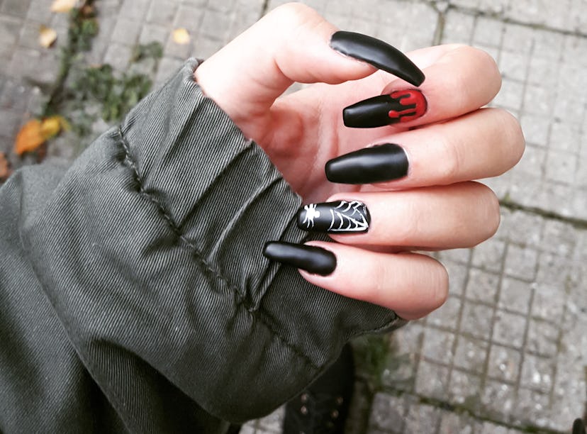 2022 Halloween nail trends include spider and the biggest 2022 Halloween nail trends include blood d...