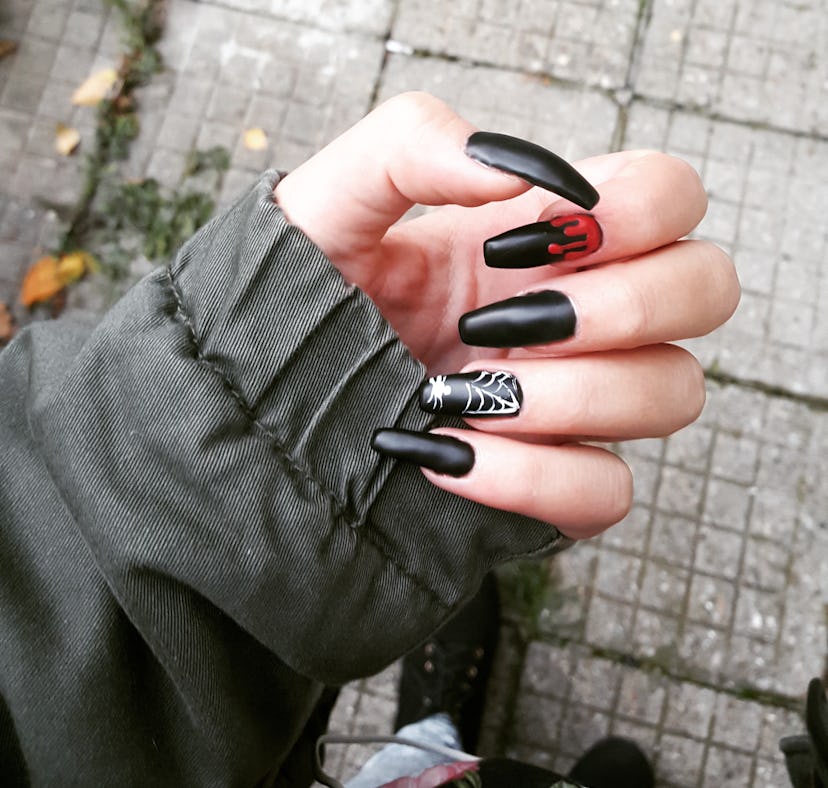 2022 Halloween nail trends include spider and the biggest 2022 Halloween nail trends include blood d...