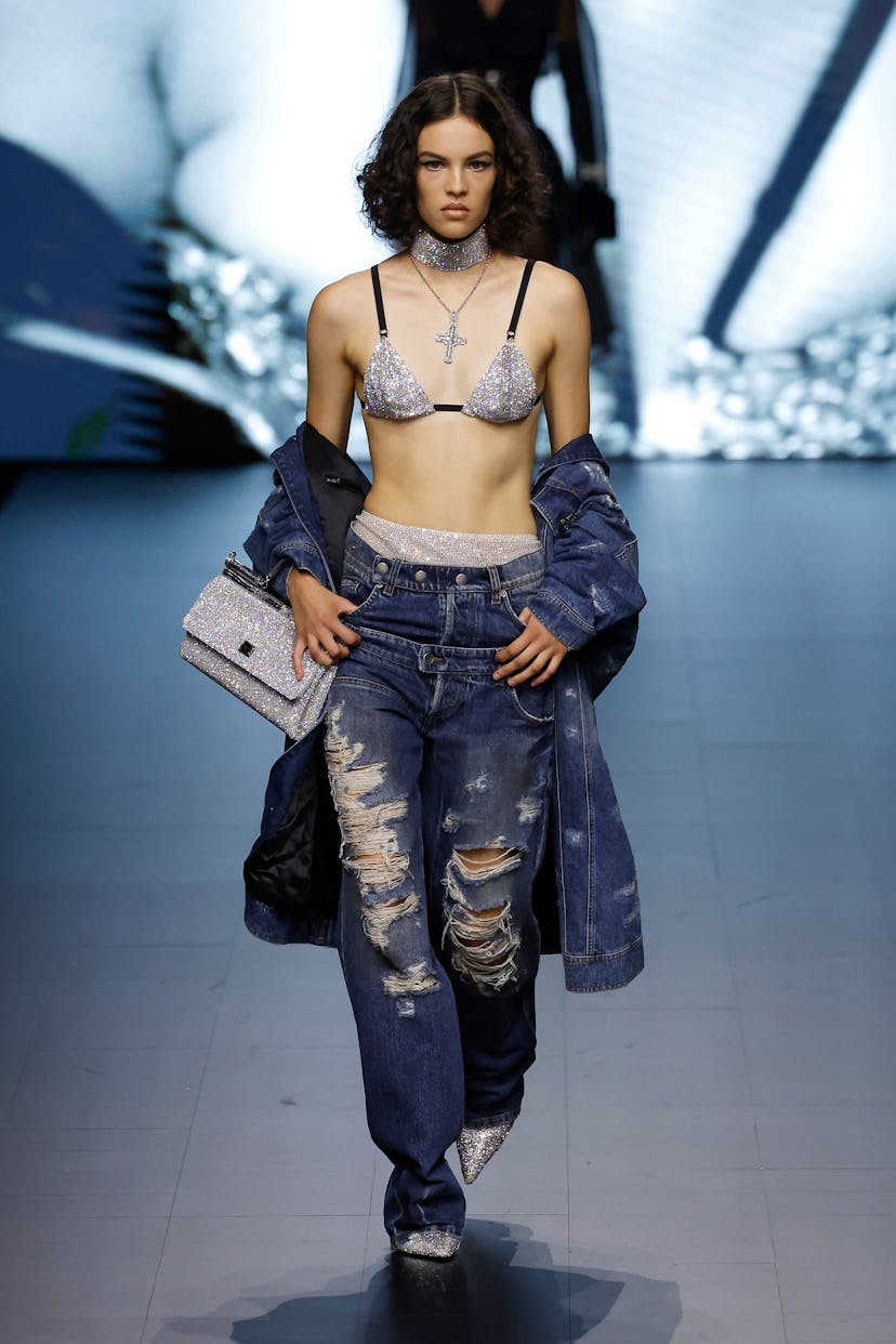 A model walks the runway of the Dolce & Gabbana Fashion Show.
