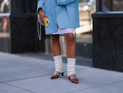 Leg warmers at Fashion Week.