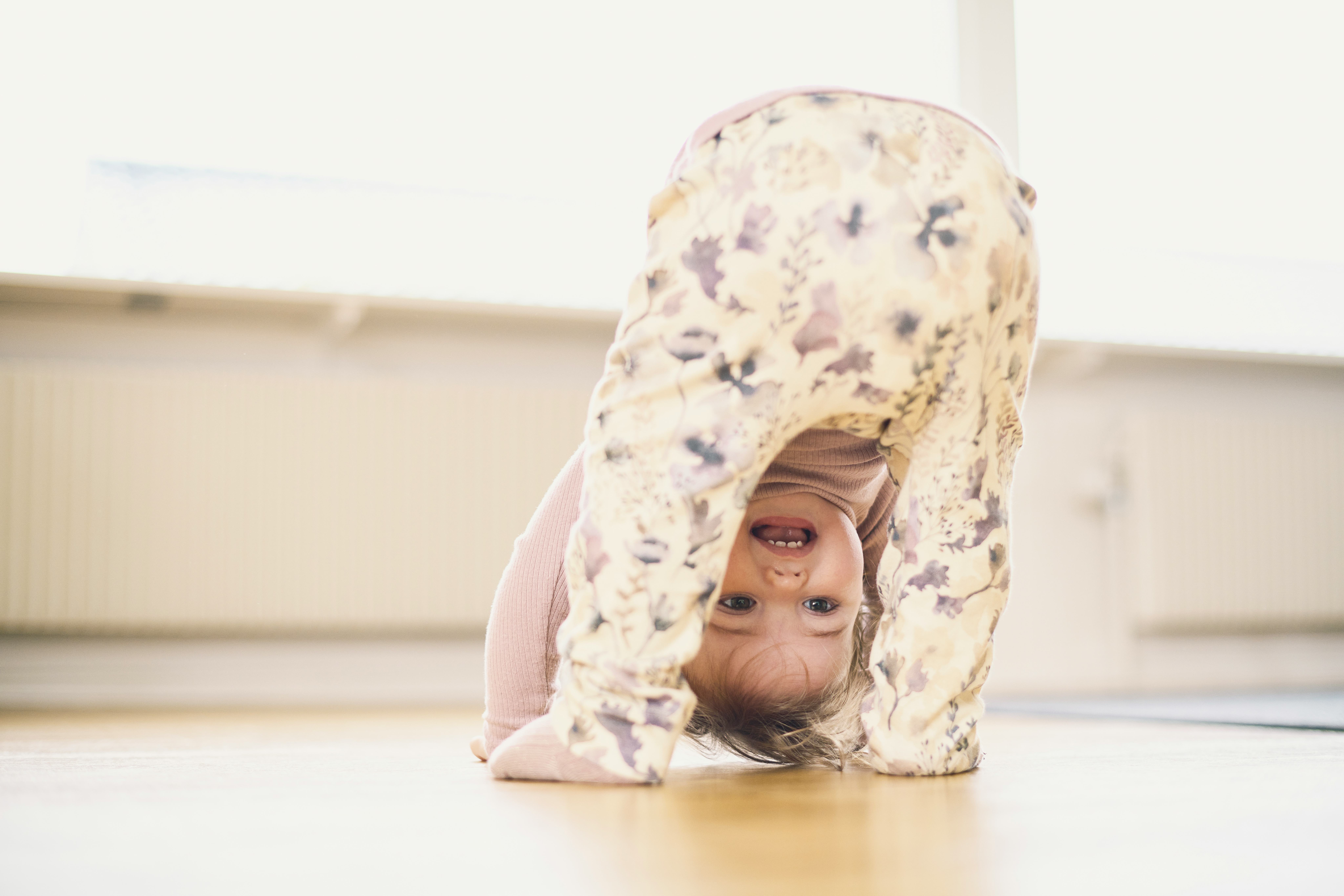 Why Do Toddlers Stand On Their Heads? It's Important For Development