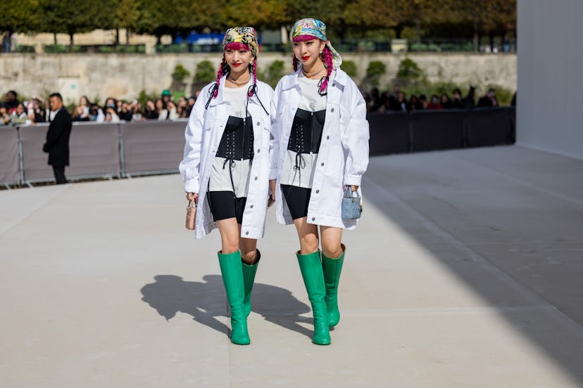 Twins Ami Amiaya and Aya wearing head scarf, white jacket, black corset, white button shirt, shorts ...