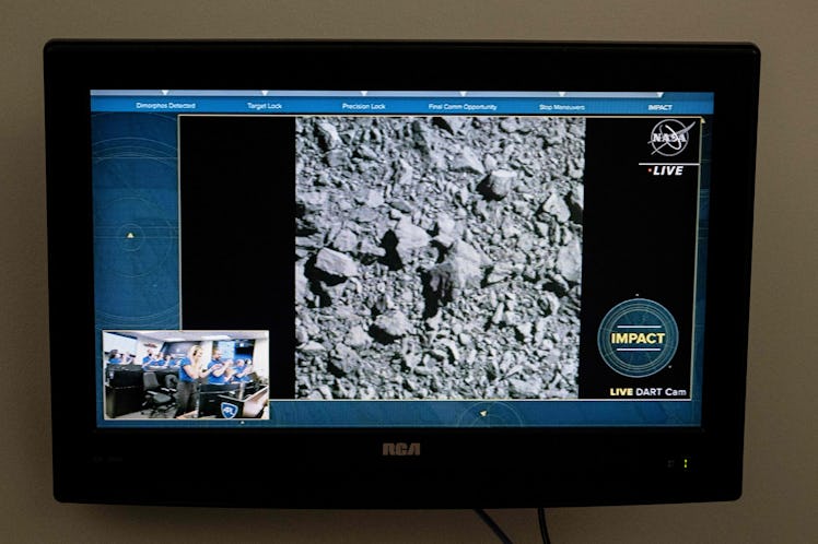 A television at NASA's Kennedy Space Center in Cape Canaveral, Florida, captures the final images fr...