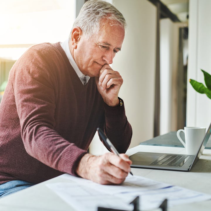 Man working on his will. A dad recently took to Reddit's AITA to see if he was in the wrong for want...