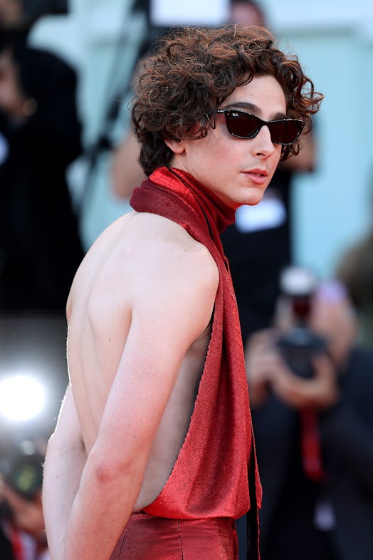 Photos of Timothée Chalamet's red jumpsuit at Venice Film Festival.