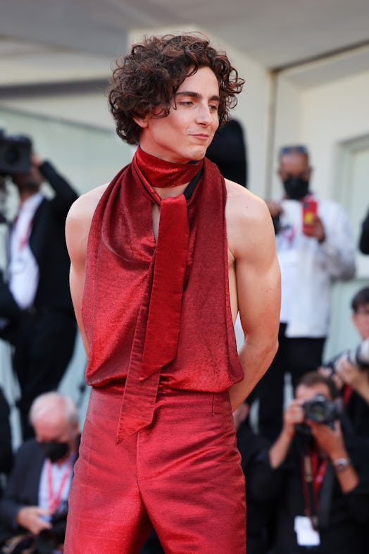 Photos of Timothée Chalamet's red jumpsuit at Venice Film Festival.