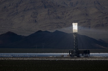 NIPTON, CA - AUGUST 26: A boiler tower is surrounded by mirrors at the Ivanpah Solar Electric Genera...