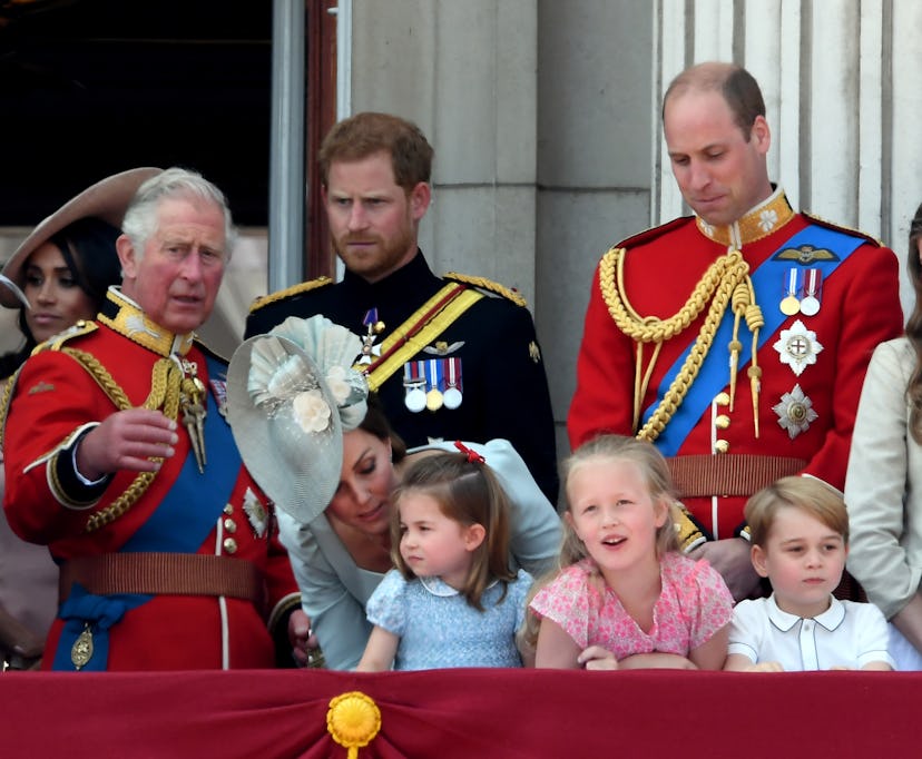 Prince Charles looked to be distracting his grandchildren.
