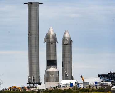 BOCA CHICA, TX - FEBRUARY 10:   SpaceX Starship spacecraft prototypes and a super heavy  booster sit...