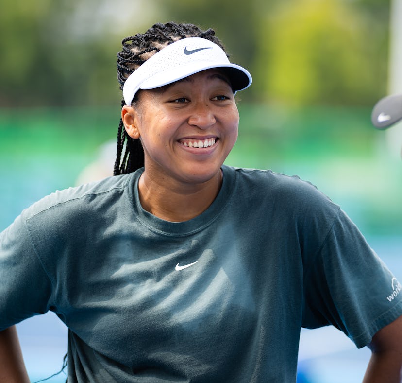Naomi Osaka met BTS' Suga at an NBA Japan game in Tokyo.