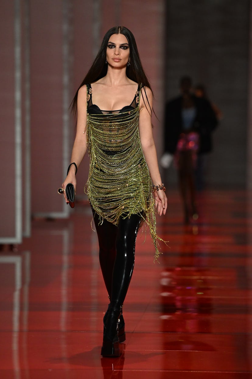 Emily Ratajkowski walks the runway at the Versace fashion show during the Milan Fashion Week Fall/Wi...