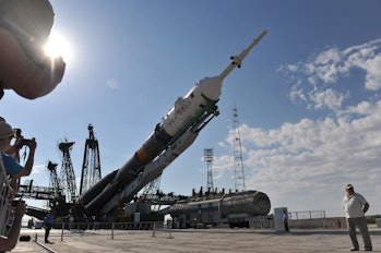 A Russian Soyuz TMA-02M rocket is mounted at a launch pad in a Russian leased Kazakh Baikonur cosmod...