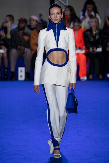 PARIS, FRANCE - SEPTEMBER 29: A model walks the runway during the Off White Ready to Wear Spring/Sum...