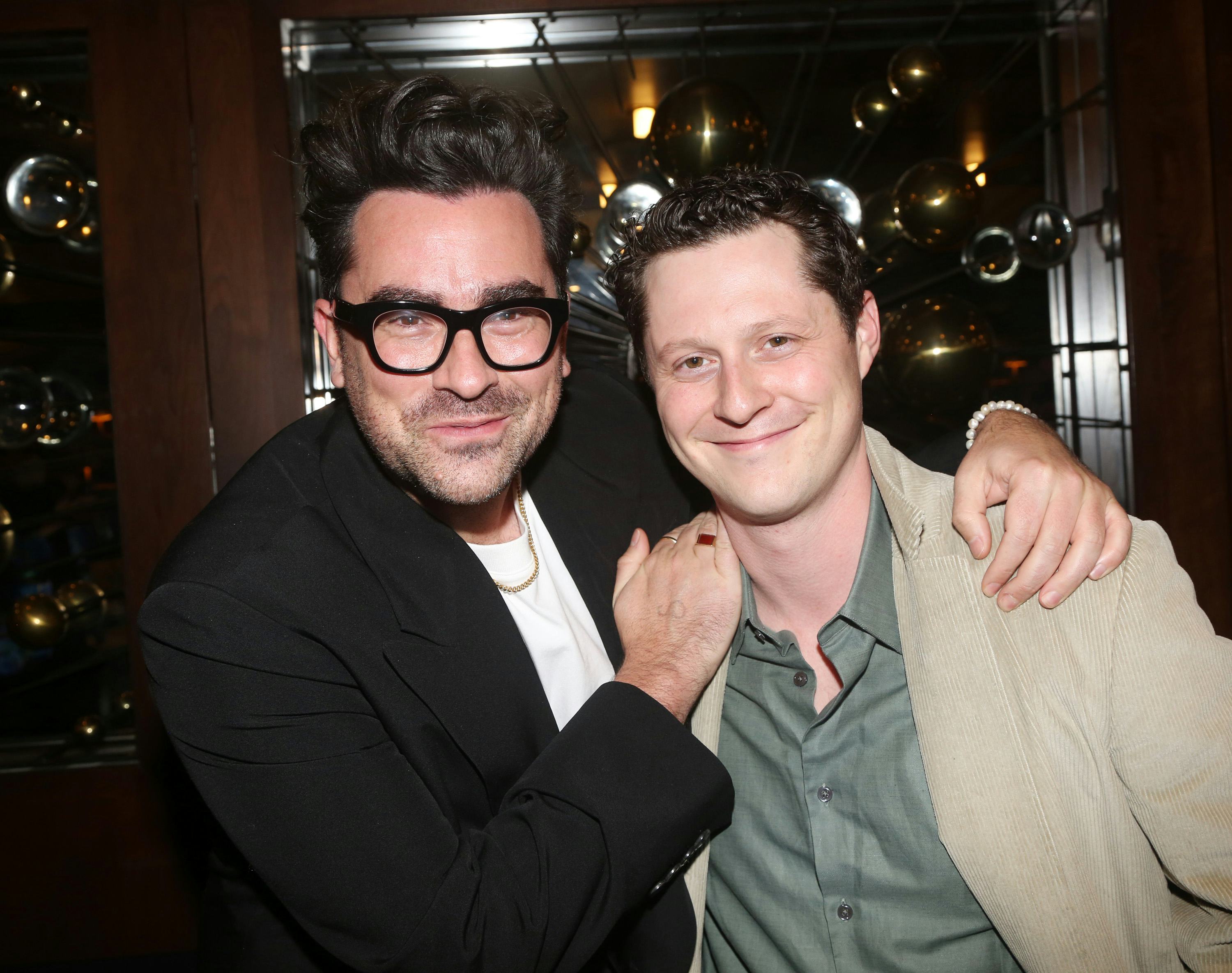 Noah Reid and Dan Levy reunited in April. Photo via Getty Images