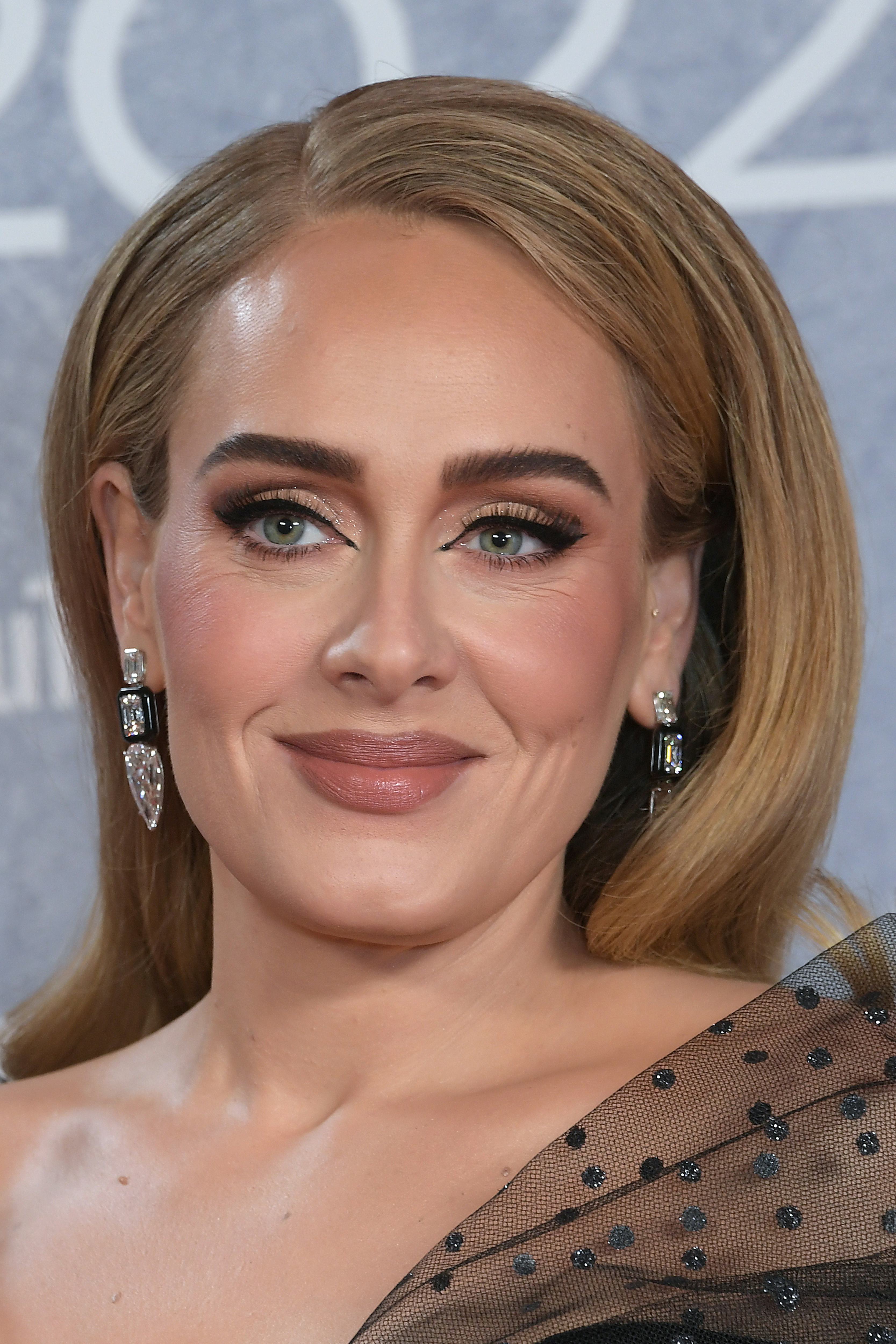 LONDON, ENGLAND - FEBRUARY 08: (EDITORIAL USE ONLY)  Adele arrives at The BRIT Awards 2022 at The O2...