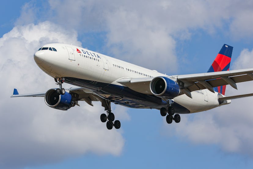 Delta Air Lines Airbus A330 aircraft as seen flying over Myrtle avenue during a summer day for landi...