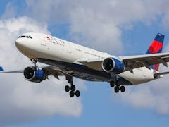 Delta Air Lines Airbus A330 aircraft as seen flying over Myrtle avenue during a summer day for landi...