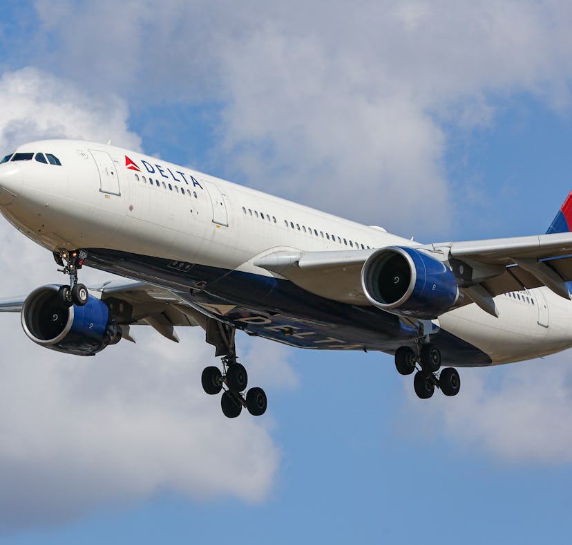 Delta Air Lines Airbus A330 aircraft as seen flying over Myrtle avenue during a summer day for landi...