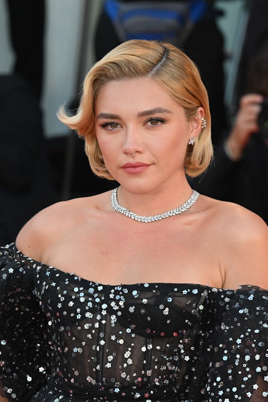 Florence Pugh posed for photos on the red carpet of the 79th Venice International Film Festival in V...