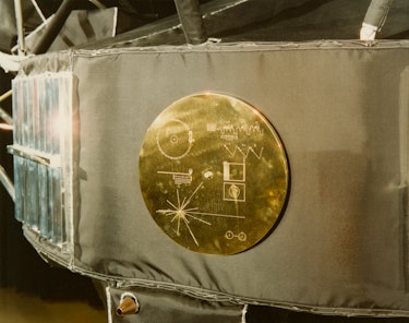 A gold record in its cover, attached to a Voyager space probe, USA, circa 1977. Voyager 1 and its id...