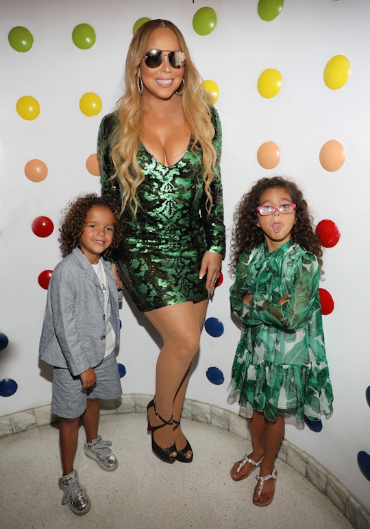 Mariah Carey wears the wrong shoes to the amusement park with her kids.