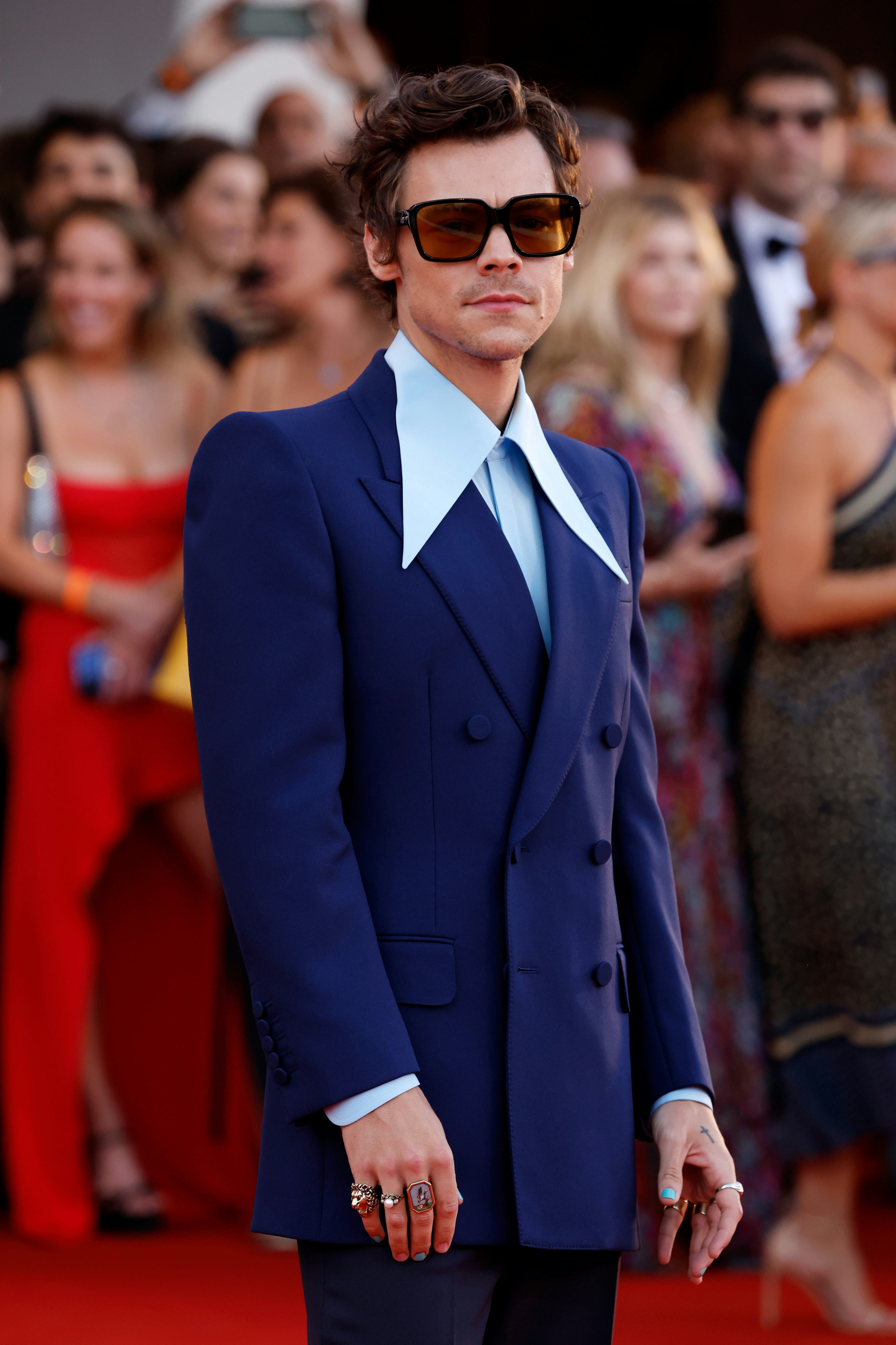 Harry Styles wore pieces from his HA HA HA Gucci collection at the 79th Venice International Film Fe...