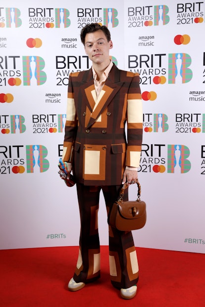 Harry Styles Style Evolution: his '70s wallpaper suit from The BRIT Awards 2021 on May 11, 2021.