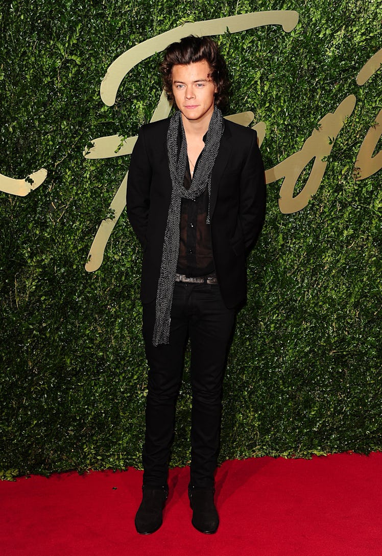Harry Styles Style Evolution: his scarf look and all-black outfit for the 2013 British Fashion Award...