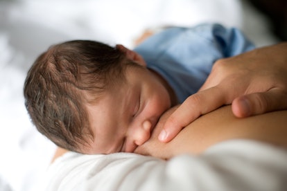 baby nursing in an article about breastfeeding pillows 
