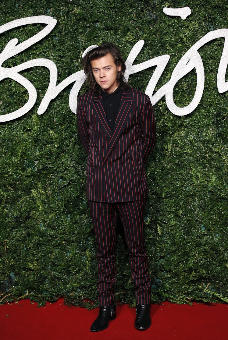 Harry Styles' Style Evolution: his Lanvin striped suit to the British Fashion Awards 2014 in London ...